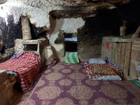 Inside a rocky room in Meymand
